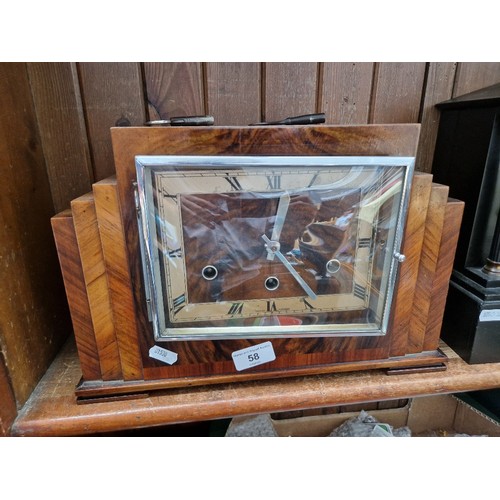 58 - An Art Deco chiming mantle clock with keys and pendulum