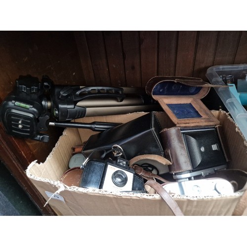 79 - A box of camera's and accessories, Kodak Brownie 127 in a case, two Ensign Selfix 620 camera's, ligh... 