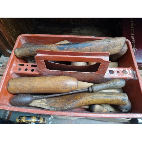 77 - A quantity of antique plumbers lead working tools.