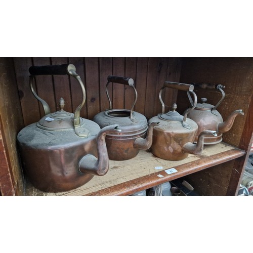 81 - Four old Copper kettles