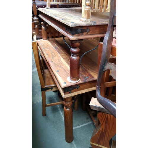 906 - A hardwood dining table and four chairs together with a matching coffee table.