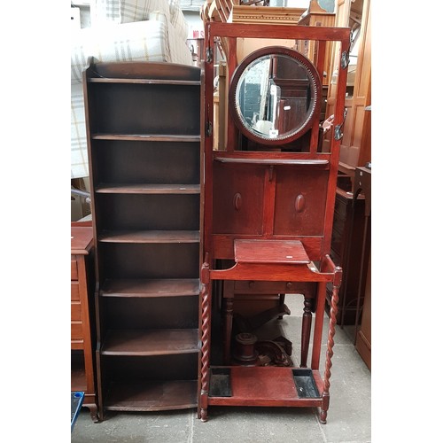 922 - An oak hallstand and a mahogany bookcase.