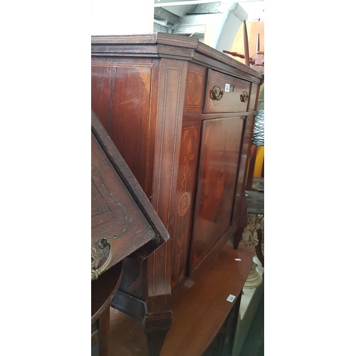 938 - A continental 19th century marquetry inlaid mahogany side cabinet.