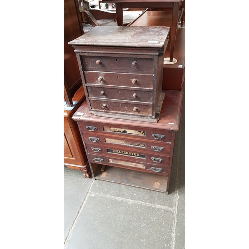 934 - Two mahogany chests of drawers/specimen cabinets, one containing photography equipment, lenses, glas... 