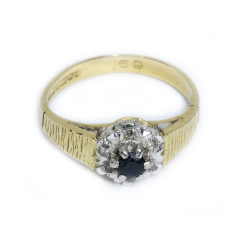 50 - A hallmarked 18ct gold cluster ring, gross weight 2.8g, size H.