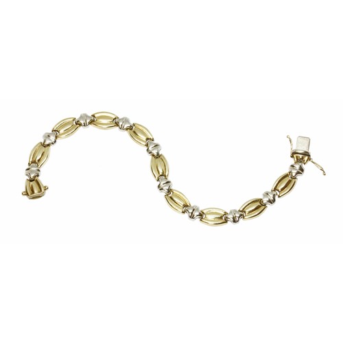 34 - A two colour gold bracelet, marked '375', length 19cm, weight 11.7g.