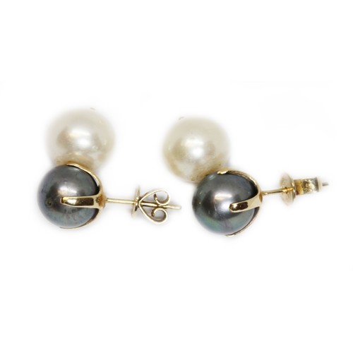 58 - A pair of grey and white cultured pearl earrings, yellow metal fittings, the butterflies marked '585... 