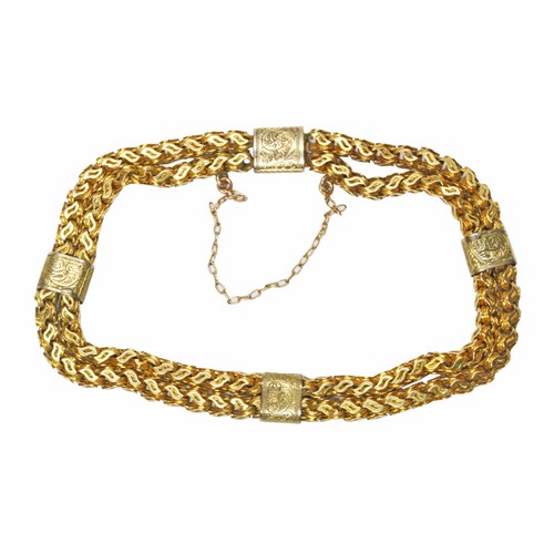 42 - A yellow metal bracelet, unmarked, length 18cm, weight 12.4g.