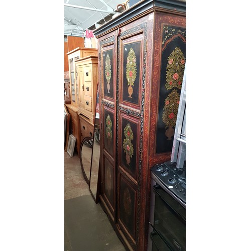 980 - An Indian painted hardwood two door cabinet, with 2 shelves height 186cm, width 105cm and depth 64cm... 