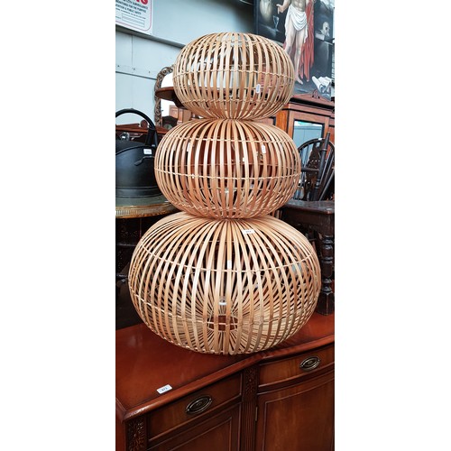 974 - A set of three graduated lobster pot style lightshades.