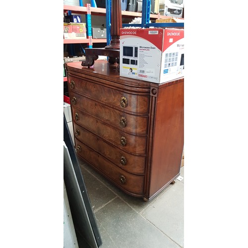 1014 - A Regency inlaid mahogany chest of drawers with original gilt brass handles.