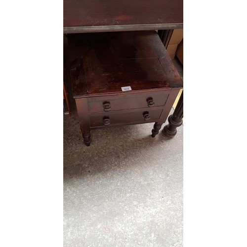 1018 - A 19th century mahogany commode.