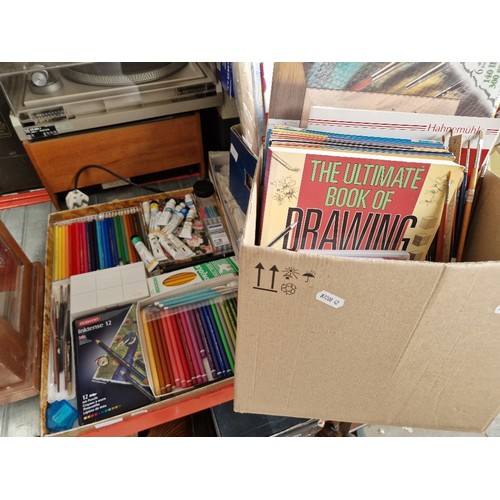 185 - Two boxes of artist's materials including gouache and watercolour paints, watercolour and pastel pad... 