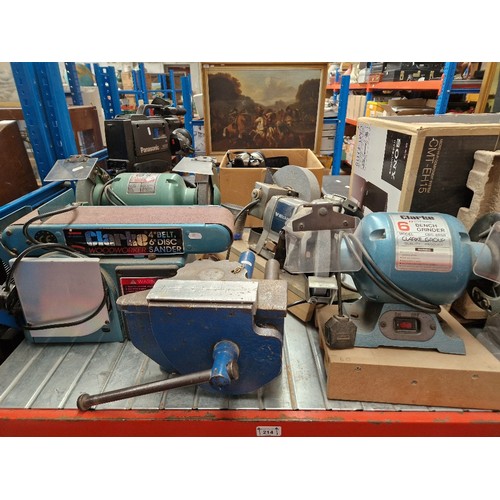 214 - 2 bench grinders, wet and dry bench grinder, engineers vice, and a 4