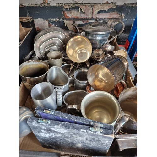 234 - A box of metalware, mainly tankards, teapot set etc