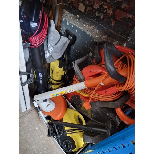 238 - A Karcher pressure washer, a steamer, a Stihl strimmer, a Spear & Jackson vacuum blower, 2 Flymo gar... 