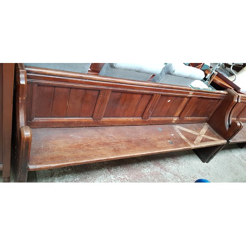 954 - A pitch pine church pew, length 212cm.