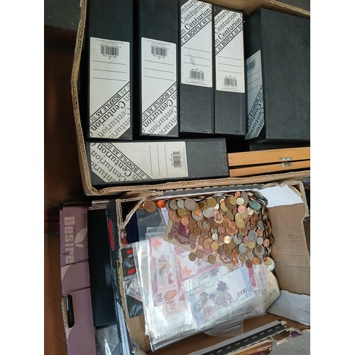 181 - A box of assorted world coins & banknotes & 2 boxes of empty files & folders.