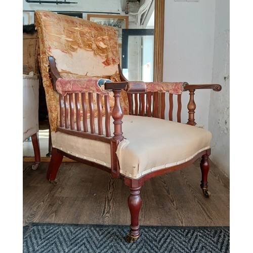 1020 - A Gillows armchair, in need of re-upholstering.