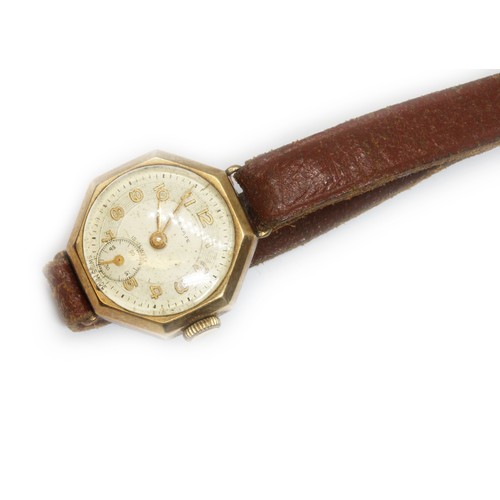 79 - A ladies 9ct gold Senate wristwatch with leather stap.