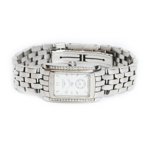 89 - LONGINES: a ladies stainless quartz wristwatch with diamond bezel, integrated stainless steel strap.