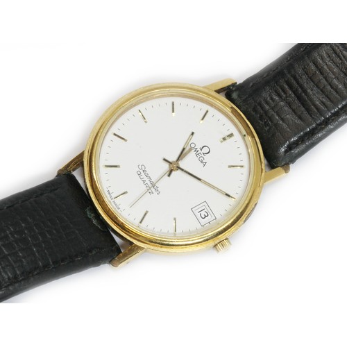 88 - OMEGA: a gold plated Seamaster Quartz wristwatch, case diameter 33mm, leather strap.