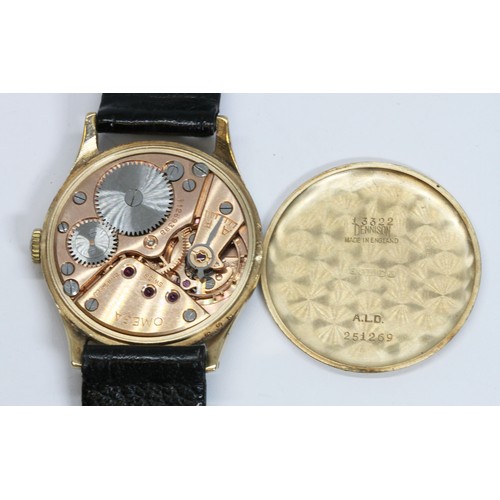 87 - A 9ct gold cased Limit III wristwatch with leather strap, case width 27mm.