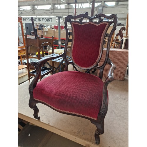 970 - An Edwardian mahogany salon suite comprising settee and two armchairs.