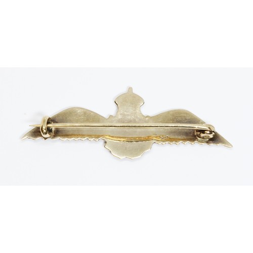 116 - An RAF wings brooch with enamel detail, marked '9ct', length 47mm, gross weight 3.9g.