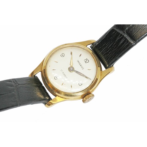 94 - A ladies 18ct gold Imperios 17 jewel manual wind wristwatch with leather strap.