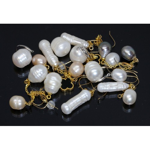 124 - Ten pairs of earrings comprising nine cultured pearls and another black onyx, the fittings marked 'A... 