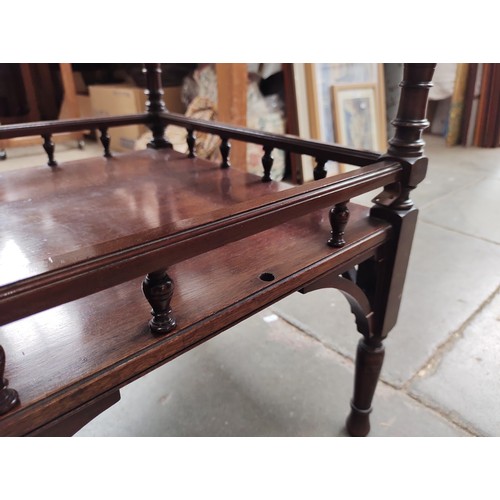 945 - An Edwardian mahogany octagonal top occasional table.