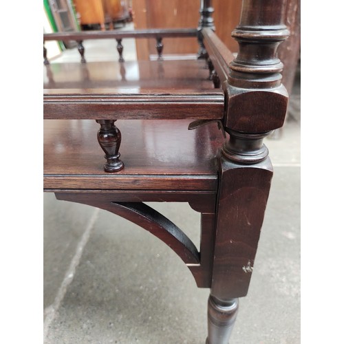 945 - An Edwardian mahogany octagonal top occasional table.