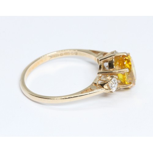 65 - A hallmarked 9ct gold yellow and colourless stone ring, gross weight2.1g, size K.