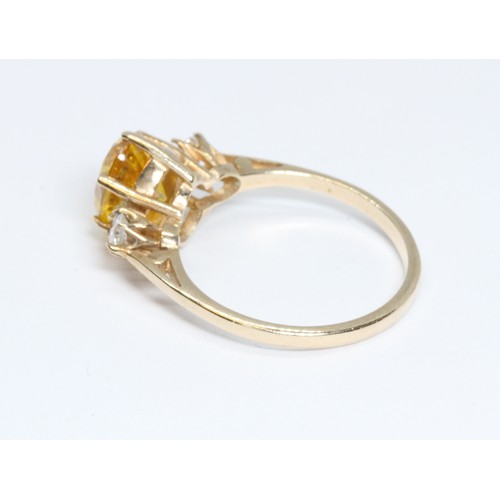 65 - A hallmarked 9ct gold yellow and colourless stone ring, gross weight2.1g, size K.