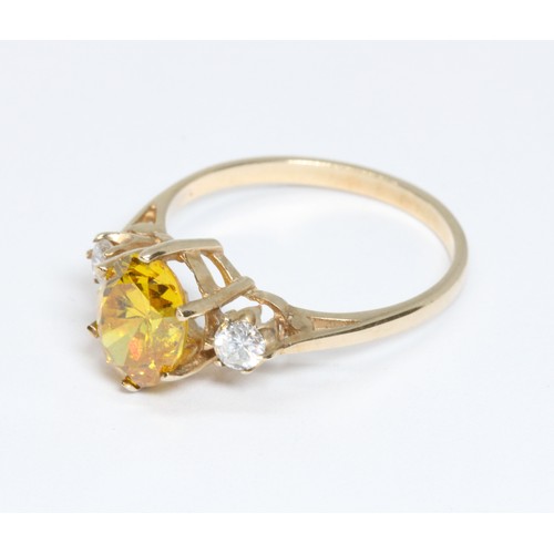 65 - A hallmarked 9ct gold yellow and colourless stone ring, gross weight2.1g, size K.