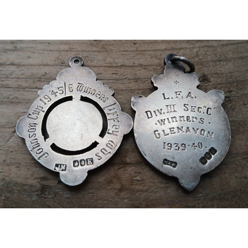 130 - Two Irish hallmarked silver sporting medals: one inscribed 'Johnson Cup1945/6 Winners...', the other... 