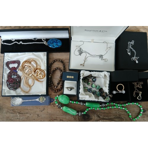 152 - A quantity of assorted mainly boxed costume jewellery including silver.