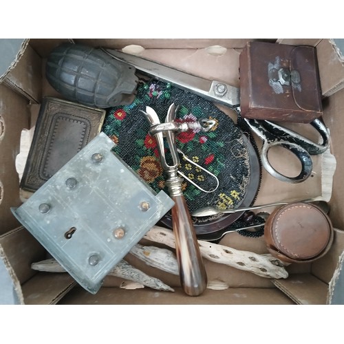 157 - A box of assorted collectables including a grenade shell, a purse, a jambone holder etc.