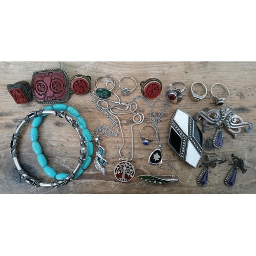 154 - A quantity of assorted jewellery including hallmarked silver and white metal, eastern etc.