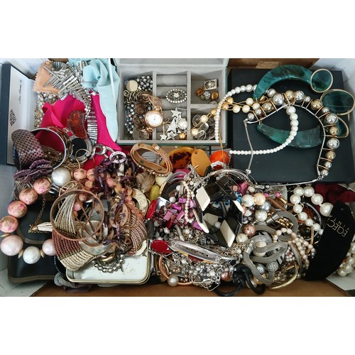 169 - A large box of assorted costume jewellery.