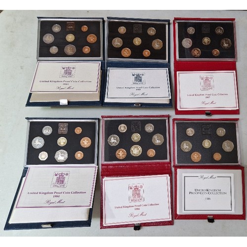 276 - A group of six Royal Mint annual United Kingdom Proof Coin Collections, 1983 to 1988, in presentatio... 