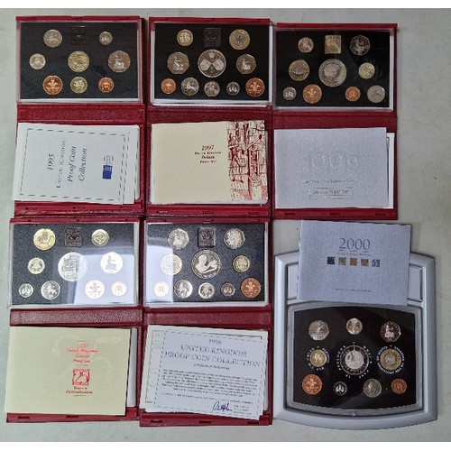 281 - A group of six Royal Mint annual United Kingdom Proof Coin Collections, 1995 to 2000, in presentatio... 