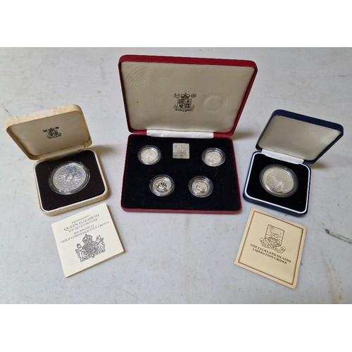 283 - A group of three silver proof coins/sets comprising of a 1984-1987 UK £1 silver proof collection, a ... 