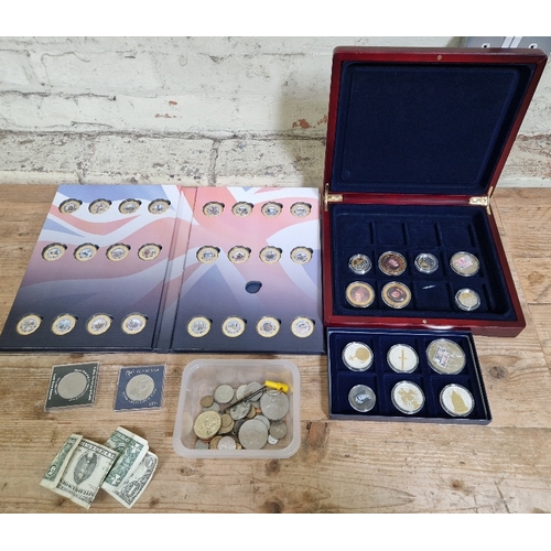 294 - A group of assorted GB & world coins to include a gold plated world war II commemorative collection,... 