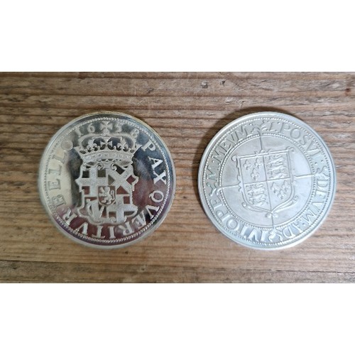 295 - Two replica hallmarked silver crowns, 1658 cromwell & Elizabeth I.