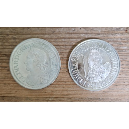 295 - Two replica hallmarked silver crowns, 1658 cromwell & Elizabeth I.