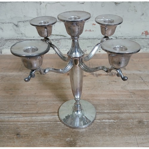 188 - A hallmarked silver filled four branch candelabrum, height 25cm.