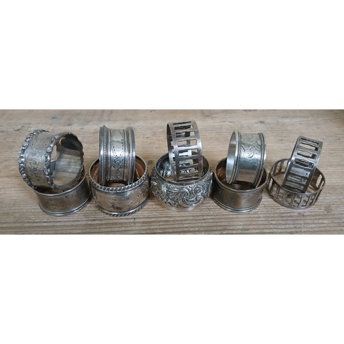 204 - Assorted hallmarked silver serviette rings, weight 6.1ozt.