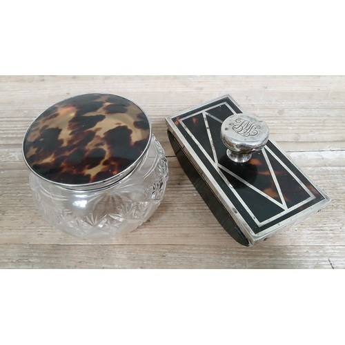 206 - A hallmarked silver tortoiseshell blotter and similar topped jar.